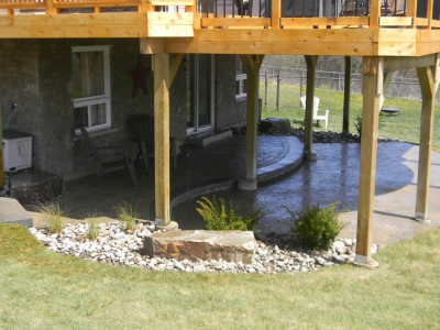 Walkout basement with Sienna steps, interlock patio and natural stone