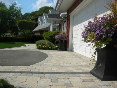 Driveway interlock apron with charcoal accenting