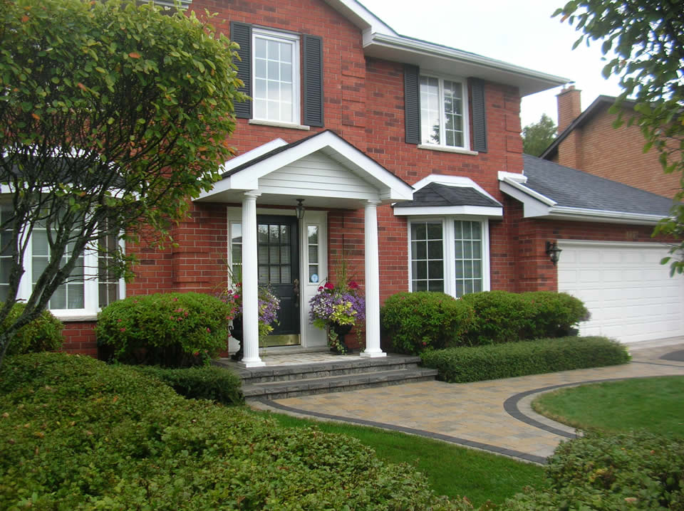 Covered porch with Roman Pisa and Brussels pavers