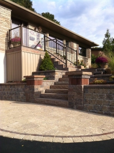 Natural Stone steps with terraced planters and pillars
