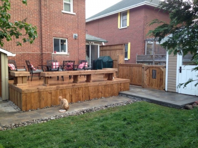 Deck with benches, privacy screen, raised landing and walkway