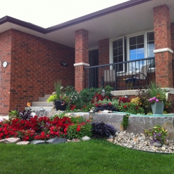 Armour Stone planter wall with plantings