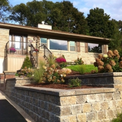 Terraced planter wall with plantings