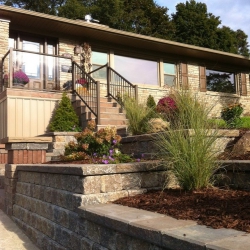 Tumbled gardens walls with pillar and plantings